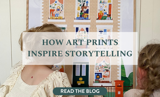 Photo of 2 girls interacting with our House Art Print with the words HOW ART PRINTS INSPIRE STORYTELLING overlaying the image
