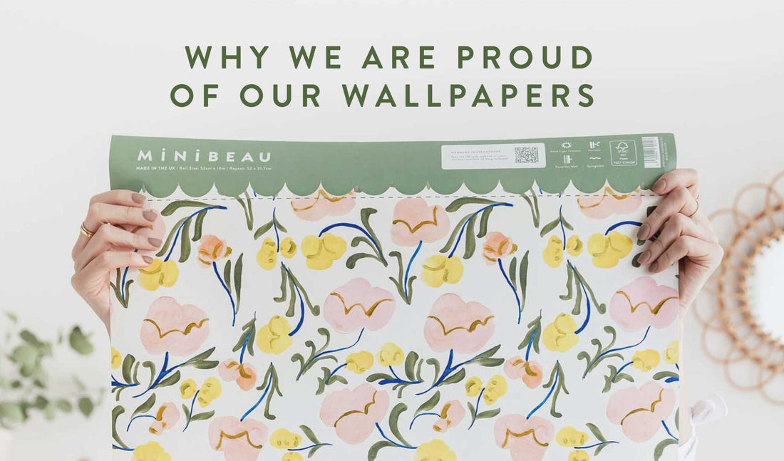 Hands holding our floral wallpaper with WHY ARE WE PROUD OF OUR WALLPAPERS written above in green