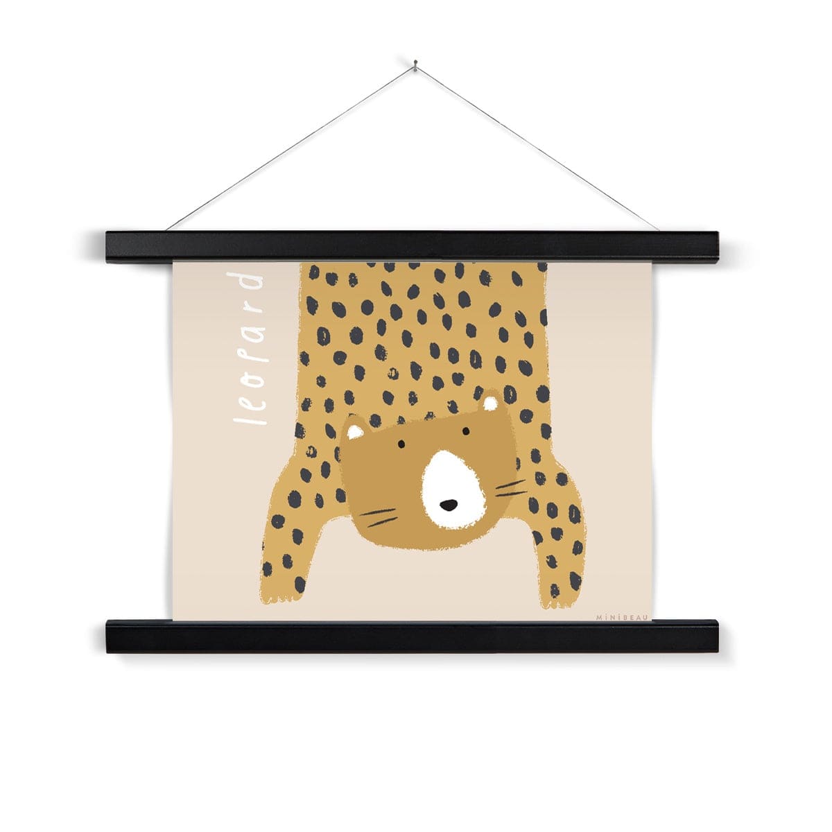 Our Leopard art print shows a hand-drawn leopard hanging down in to the picture, lifting it's head to look out at us on a beige background, with the word leopard written alongside it, in a black wooden hanger, hanging from a nail in a white wall