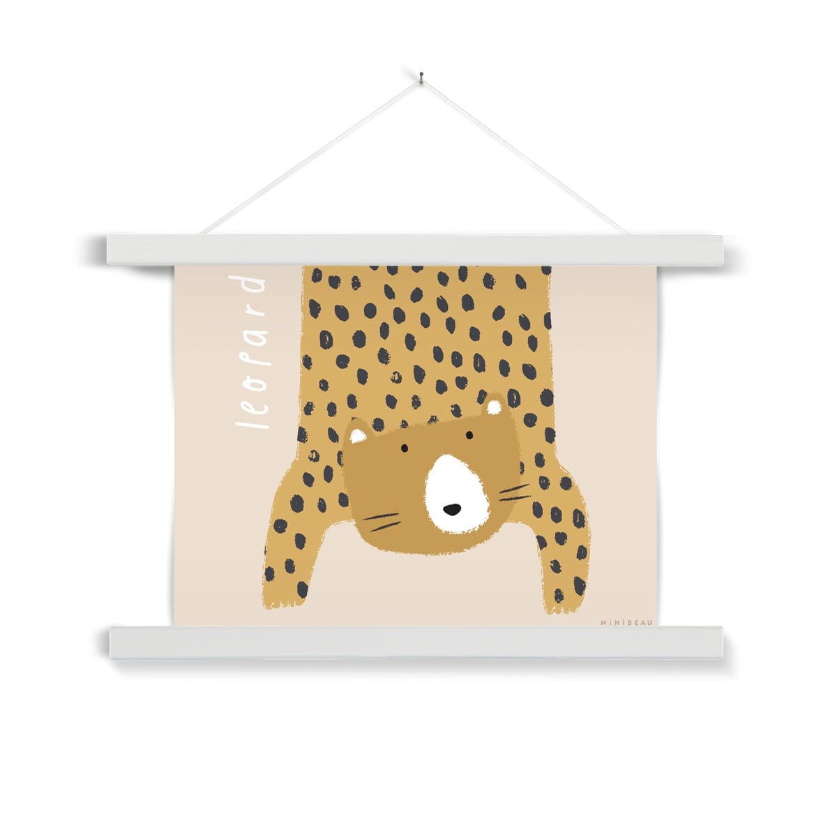 Our Leopard art print shows a hand-drawn leopard hanging down in to the picture, lifting it's head to look out at us on a beige background, with the word leopard written alongside it, in a white wooden hanger, hanging from a nail in a white wall