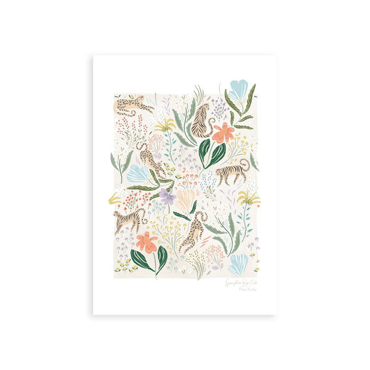 Our Springtime Big Cats art print features dainty florals in pinks, corals, and purples, with lush folliage with tigers and leopards in amongst the plants, with a white border.