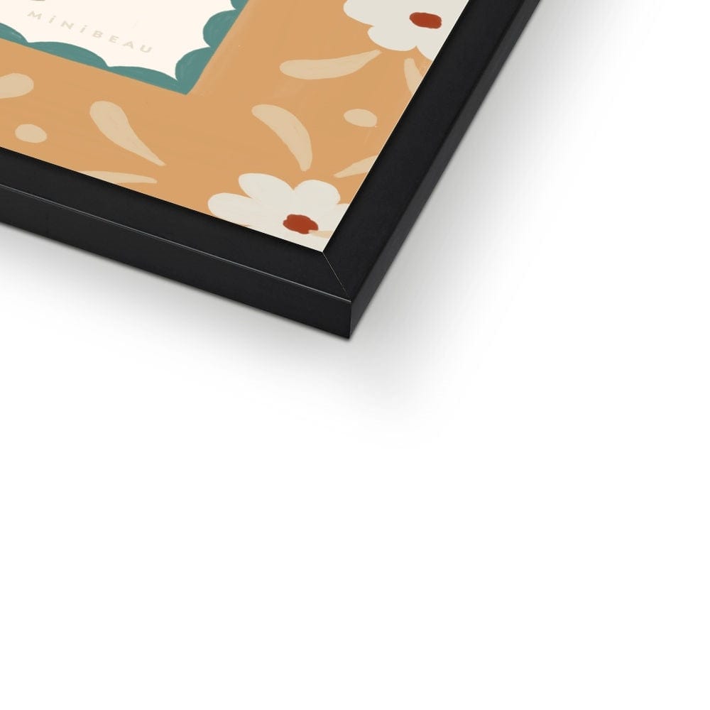 Photo showing the bottom right hand corner of the framed print, highlighting the hand-painted detail and the black frame