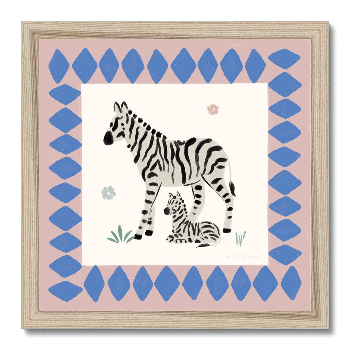 Hand-painted square picture of an adult and baby zebra, with the baby laying slightly under the standing adult both looking out into the same direction. 2 simple small flowers. are in the background, one pink, one blue, with 2 tufts of grass one at the front and one at the back of the giraffe. Around the zebras is a wide dusty pink border with blue diamonds in a natural wooden frame