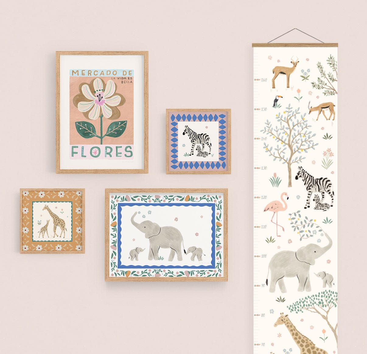 Image of a gallery wall featuring our pretty serengeti zebra, giraffe and elephant prints with the mercado de flores art print in natural wood frames on a neutral wall, with our pretty serengeti height chart