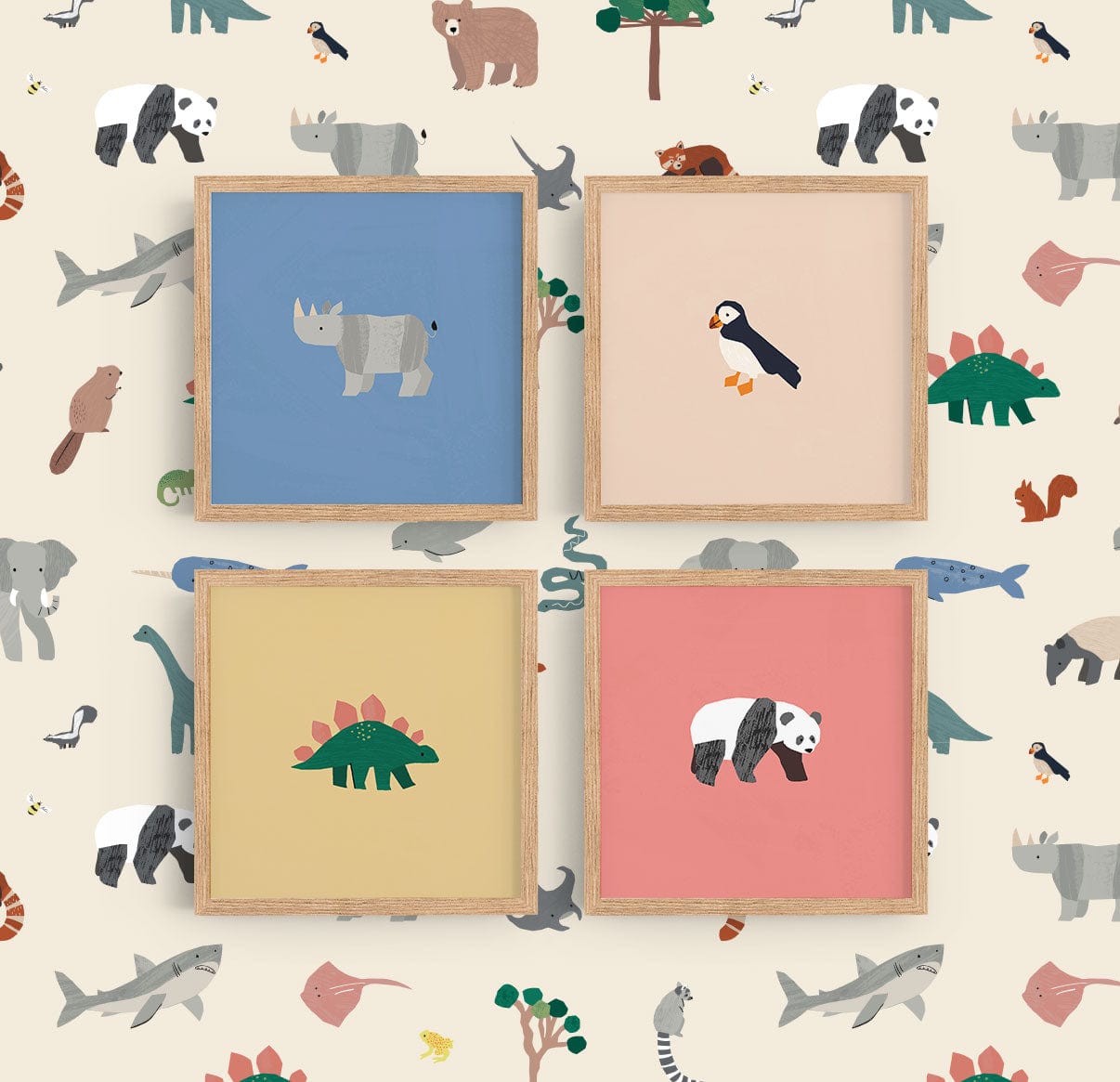 Image of a gallery wall made up of our square safari art prints, puffin, rhino, dino, and panda in natural wood frames on a wall with our papercut animals wallpaper