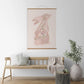 Floral inspired pink bunny art wall hanging with oak wood hanging apparatus  