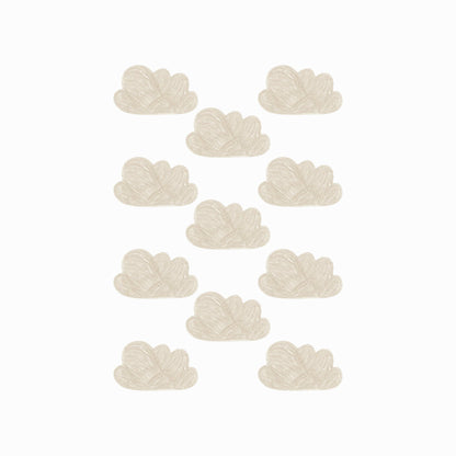 Image showng a sheet of the hand-painted mini cloud wall stickers in brown