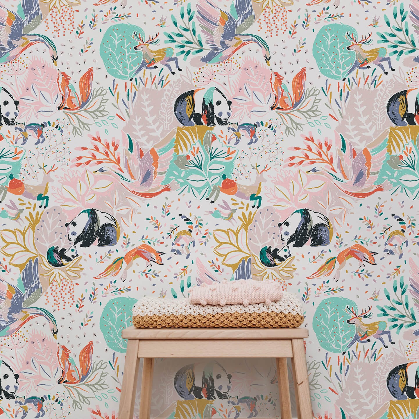Wallpaper of a mummy panda and baby panda, a leaping deer, a fox, swan, racoon, rabbit with floral artwork surrounding.