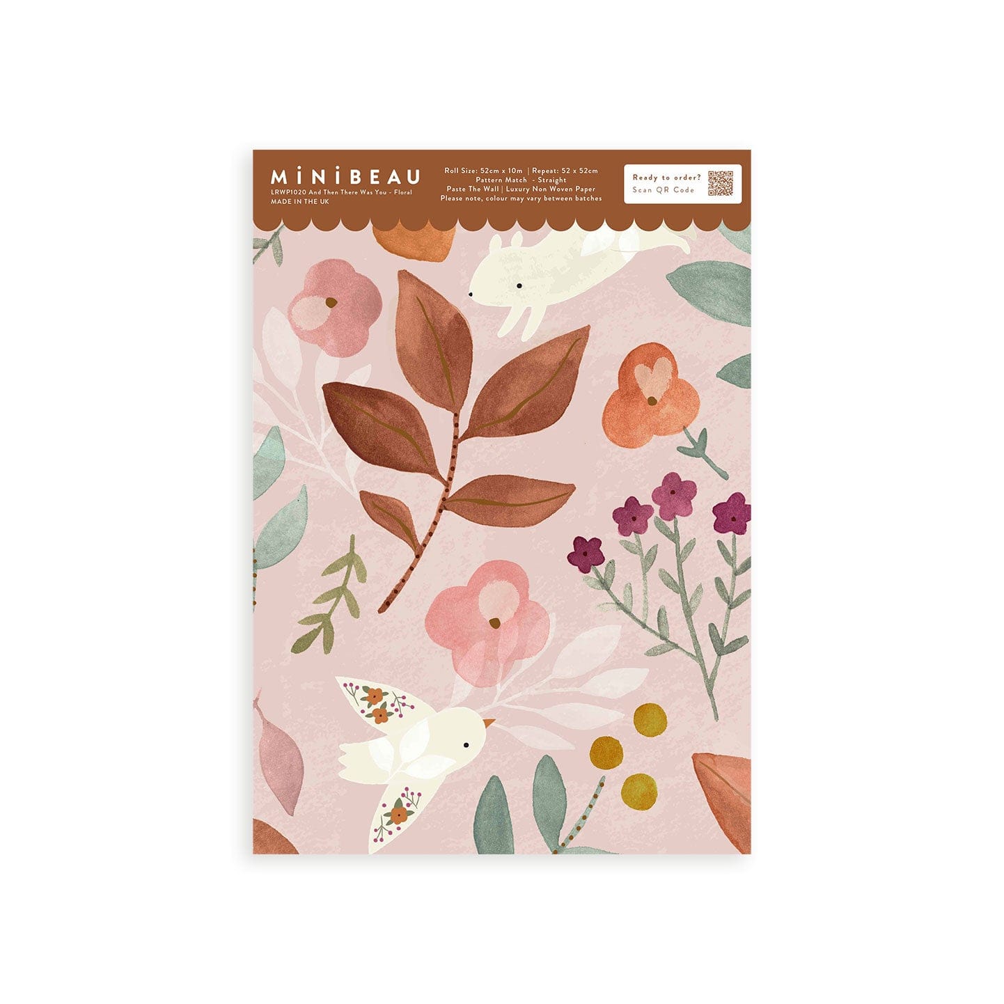 Wallpaper sample of vintage pink background with cream birds and squirrels with floral detailing. vintage pink and orange flowers with green leaves.