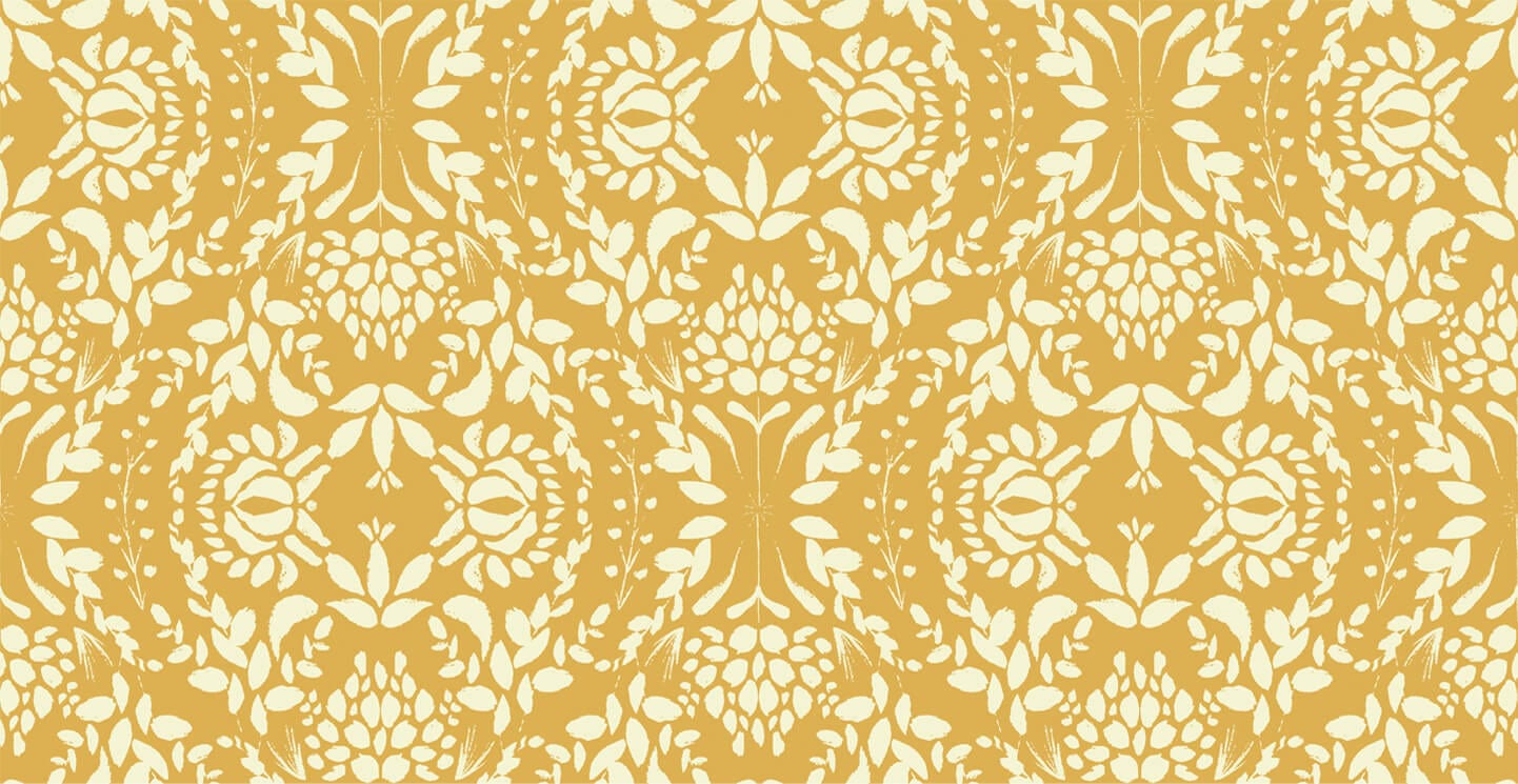 Wallpaper sample of mustard background with cream floral detailing of leaves and petals.
